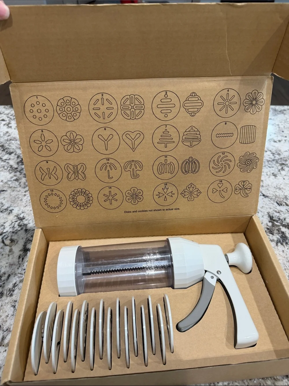The Pampered Chef White Cookie Press with 16 Decorative Discs